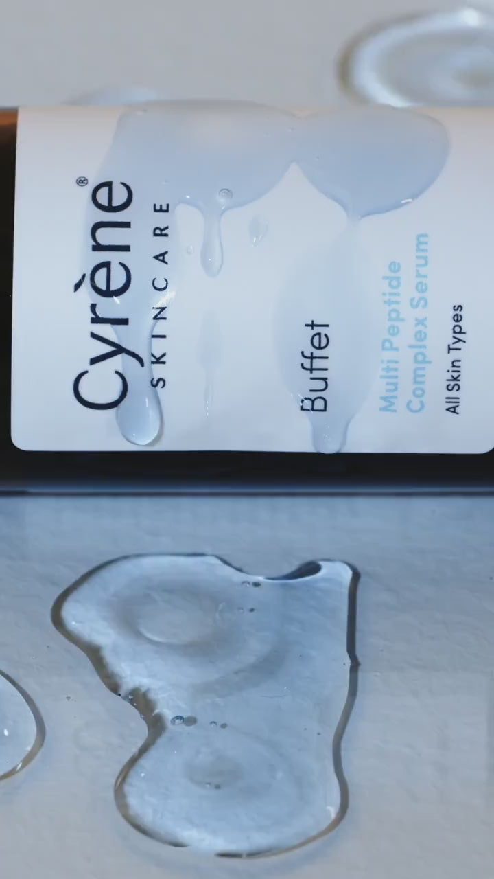 Close-up of the blue texture of Cyrène Buffet Multi-Peptide Complex serum beside its bottle